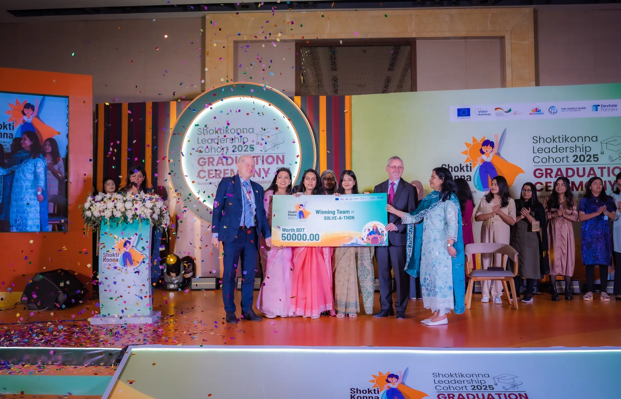 The winning Solve-A-Thon team receiving a BDT 50,000 award on stage at the 2025 graduation ceremony